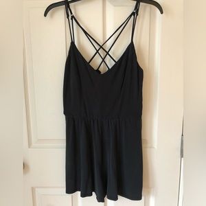 Black romper size (S) with adjustable cross back straps